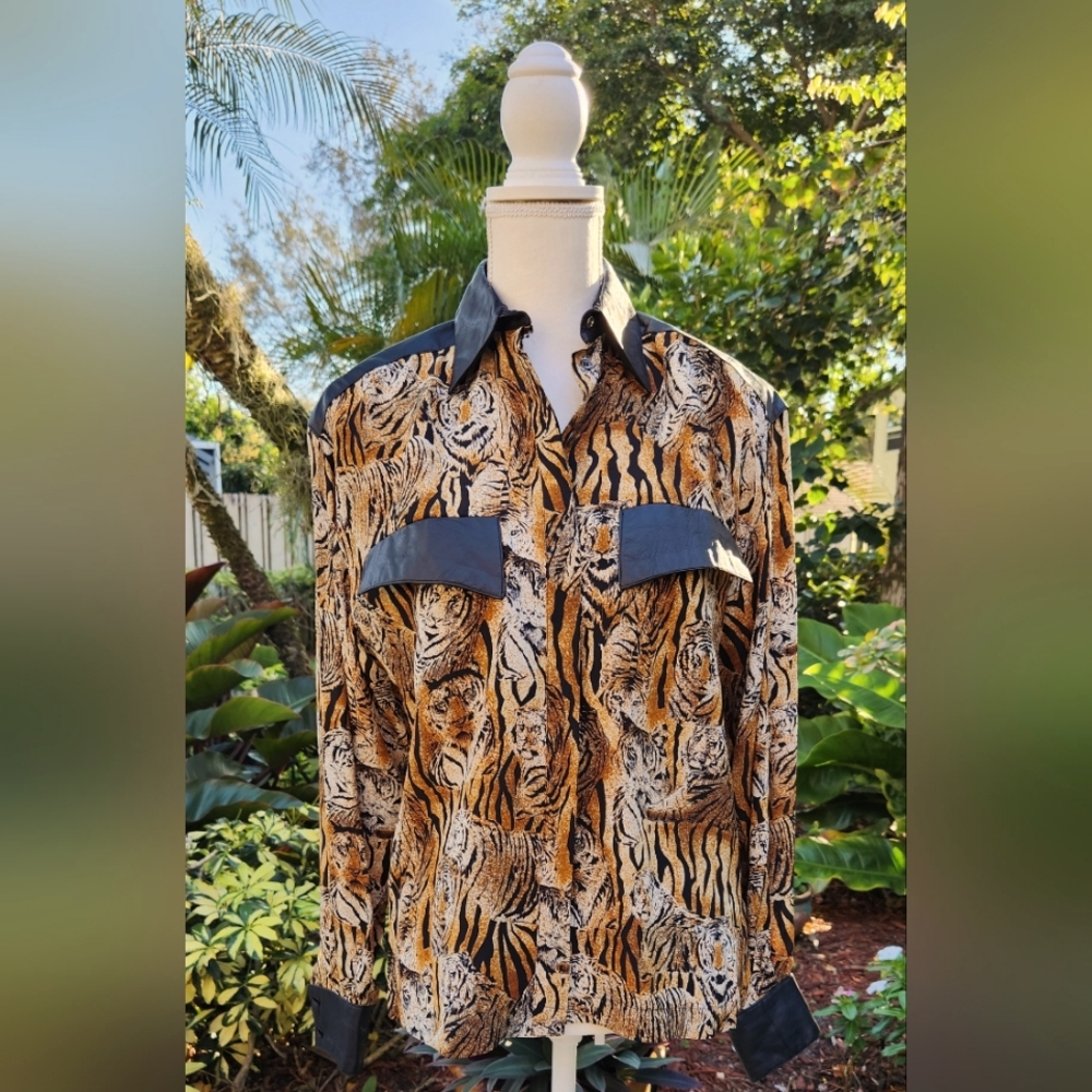 Animal Print silk and leather blouse made in Hong Kong.